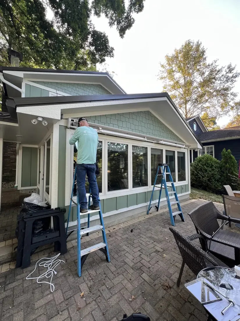 Longshade's install crew at work on a home exterior