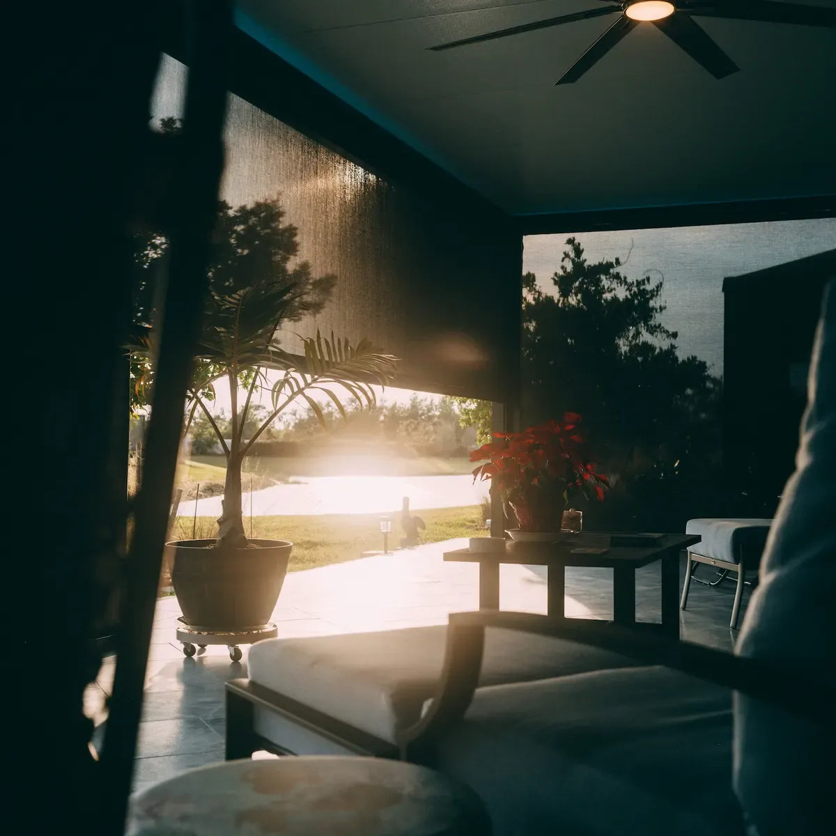 Longshade's outdoor living space with motorized screens at dusk