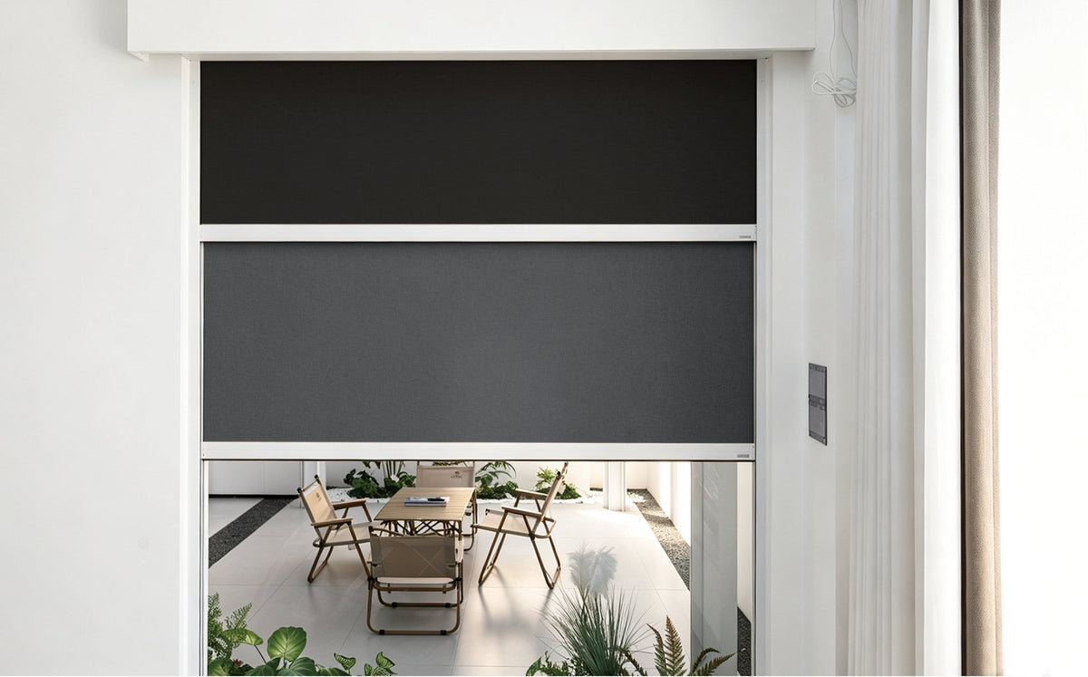 LS-130-180 compact windproof roller blind at a window