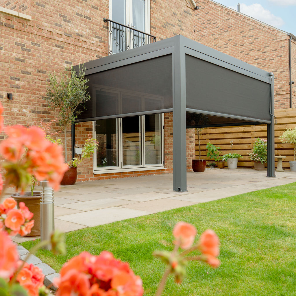 PergoSTET Plus 3m x 4m Rectangular Wall Mounted Pergola with 3 Manual Side Blinds and LED Lighting in Grey